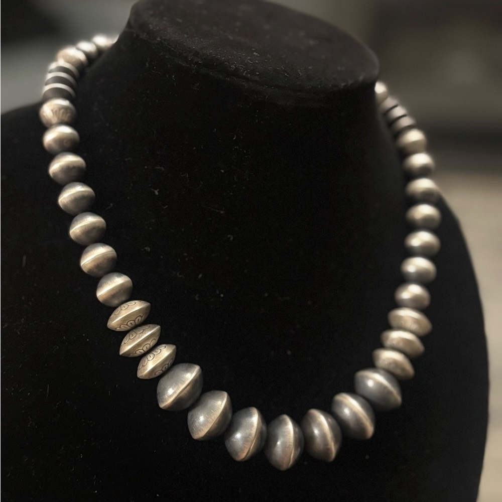 Rose Martin Graduated Stamped Pearls.